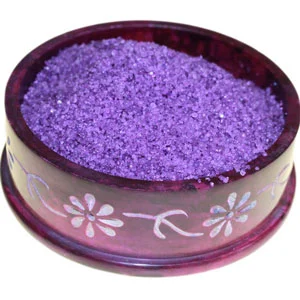 decorative dish containing violet coloured simmering salts